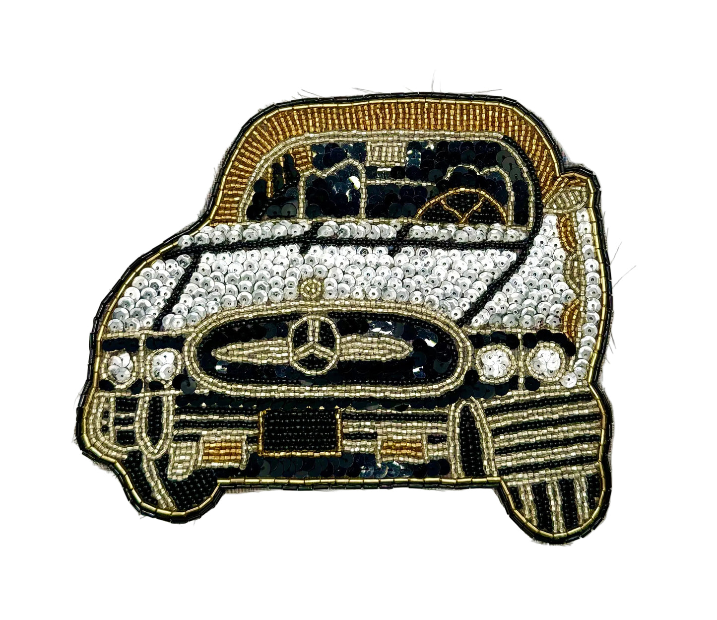 A vintage sequin and bead patch of a vintage Mercedes-Benz car, embellished with rhinestones on the hood and grille, featuring gold and black thread on a white background.