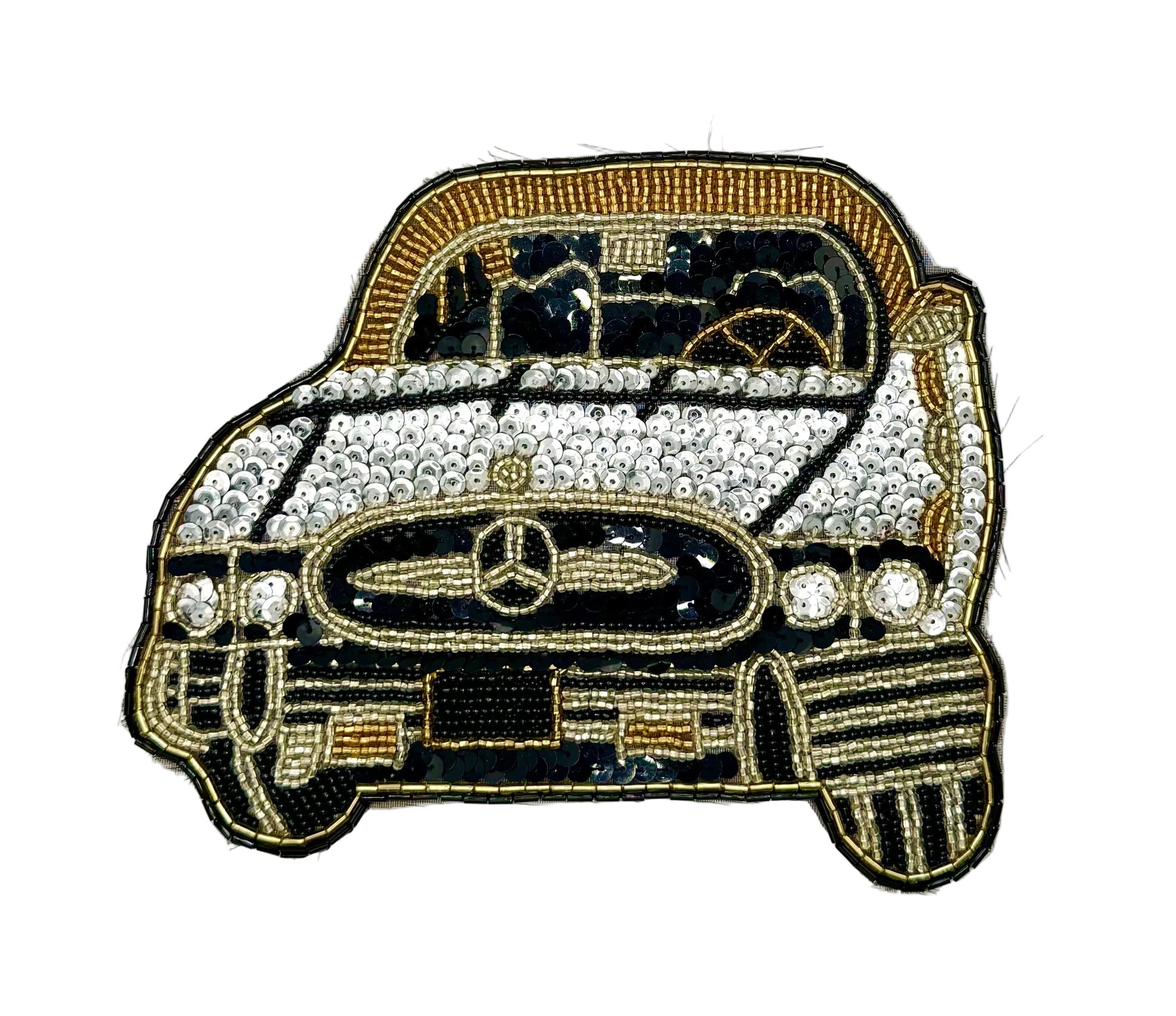A vintage sequin and bead patch of a vintage Mercedes-Benz car, embellished with rhinestones on the hood and grille, featuring gold and black thread on a white background.