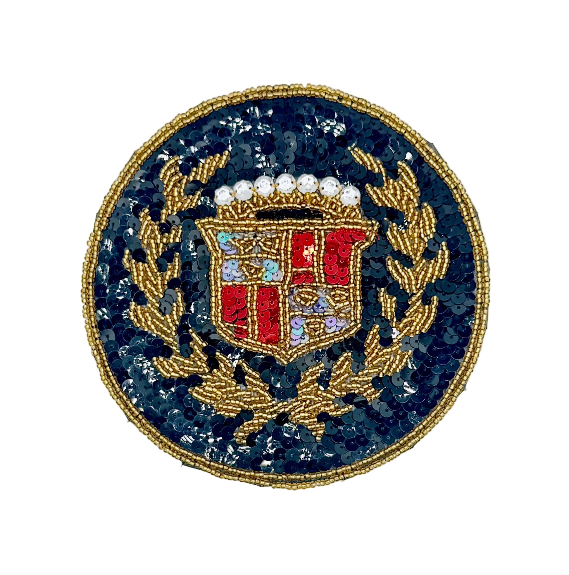 A circular vintage sequin and bead patch featuring a gold laurel wreath and a shield with red, blue, and white details, set against a black sequined background on a white backdrop.