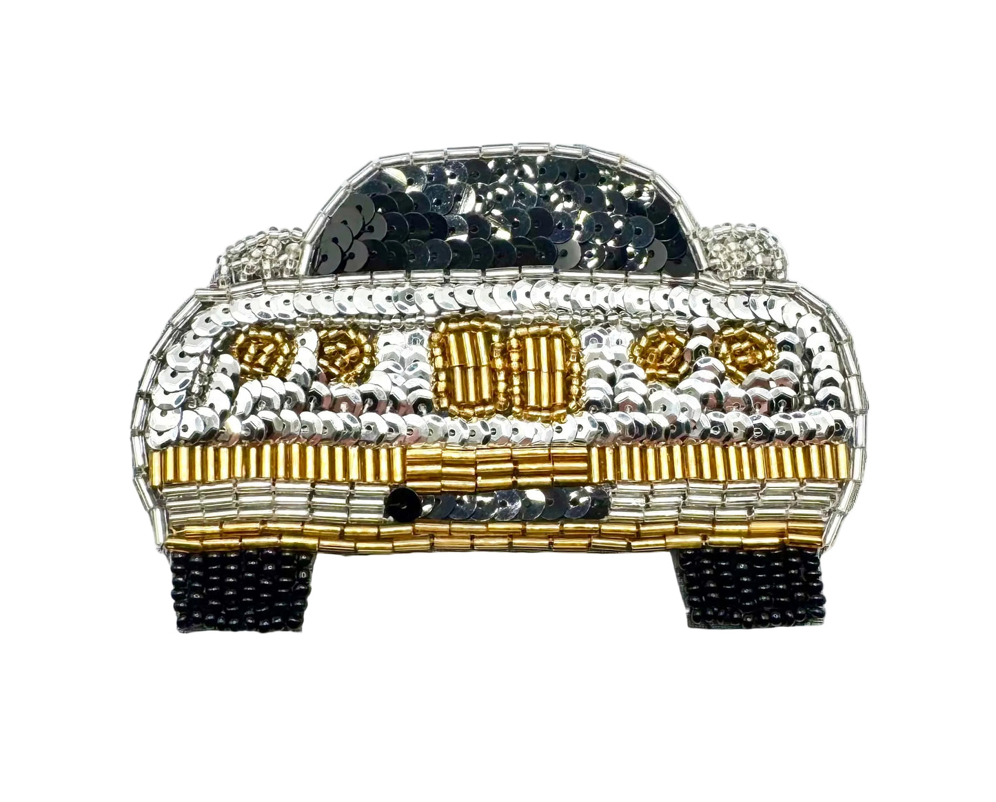 A decorative car-shaped embellishment or patch made from silver, gold, and black sequins and beads, shown on a plain white background.