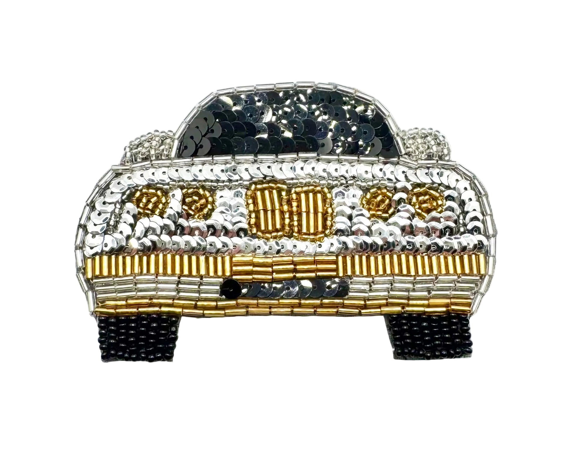 A decorative car-shaped embellishment or patch made from silver, gold, and black sequins and beads, shown on a plain white background.