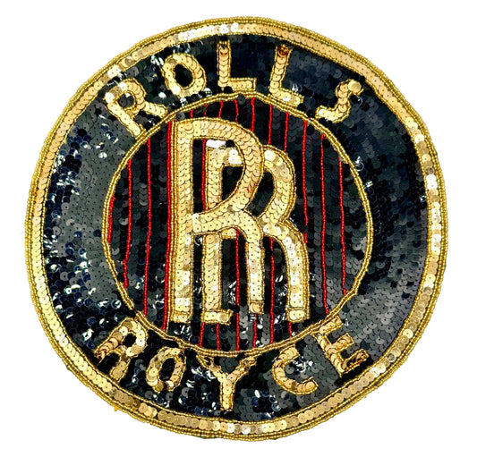 A circular vintage embroidered patch featuring the Rolls-Royce double R logo in gold sequins, surrounded by the words 'ROLLS ROYCE' in gold lettering on a black sequined background with red vertical stripes.