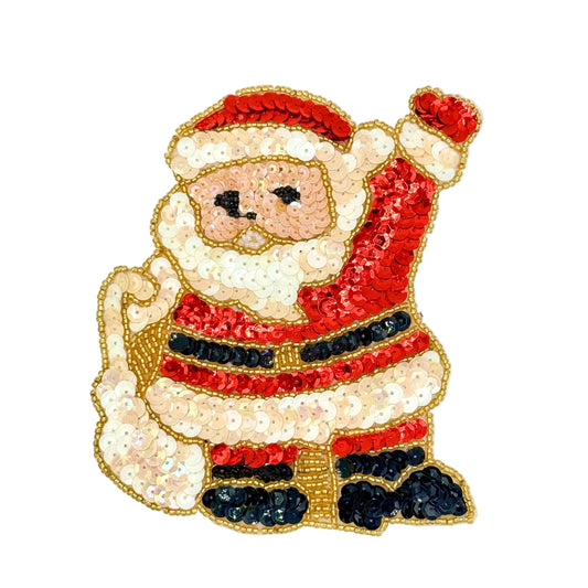 A festive sequined Santa Claus patch or applique shown on a plain white background. The design features red and cream sequins with black accents for the belt, boots, and facial features, outlined in gold sequins.