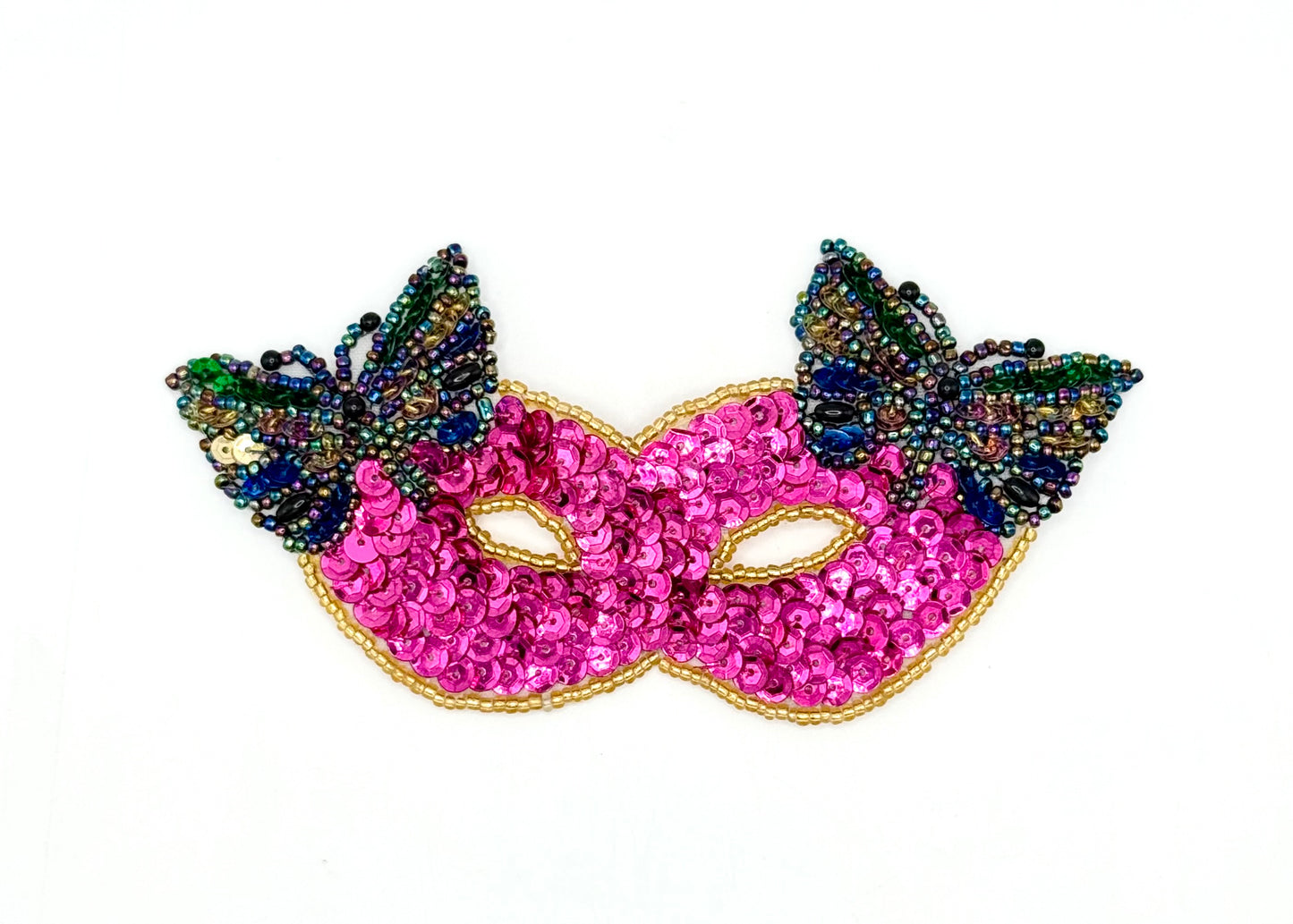 Pink sequin mask with butterfly wings on a white background
