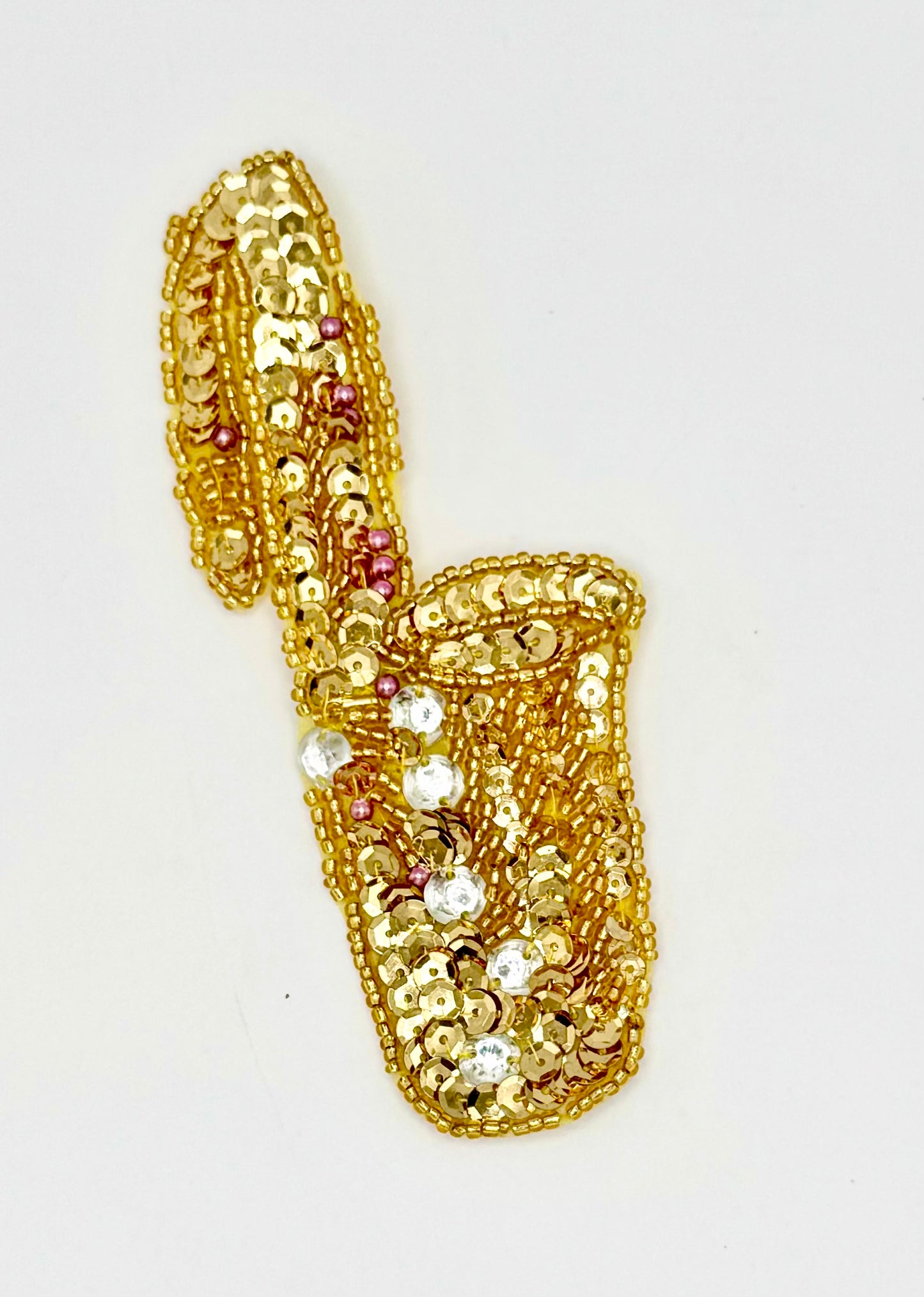 Gold beaded Saxophone on a white background
