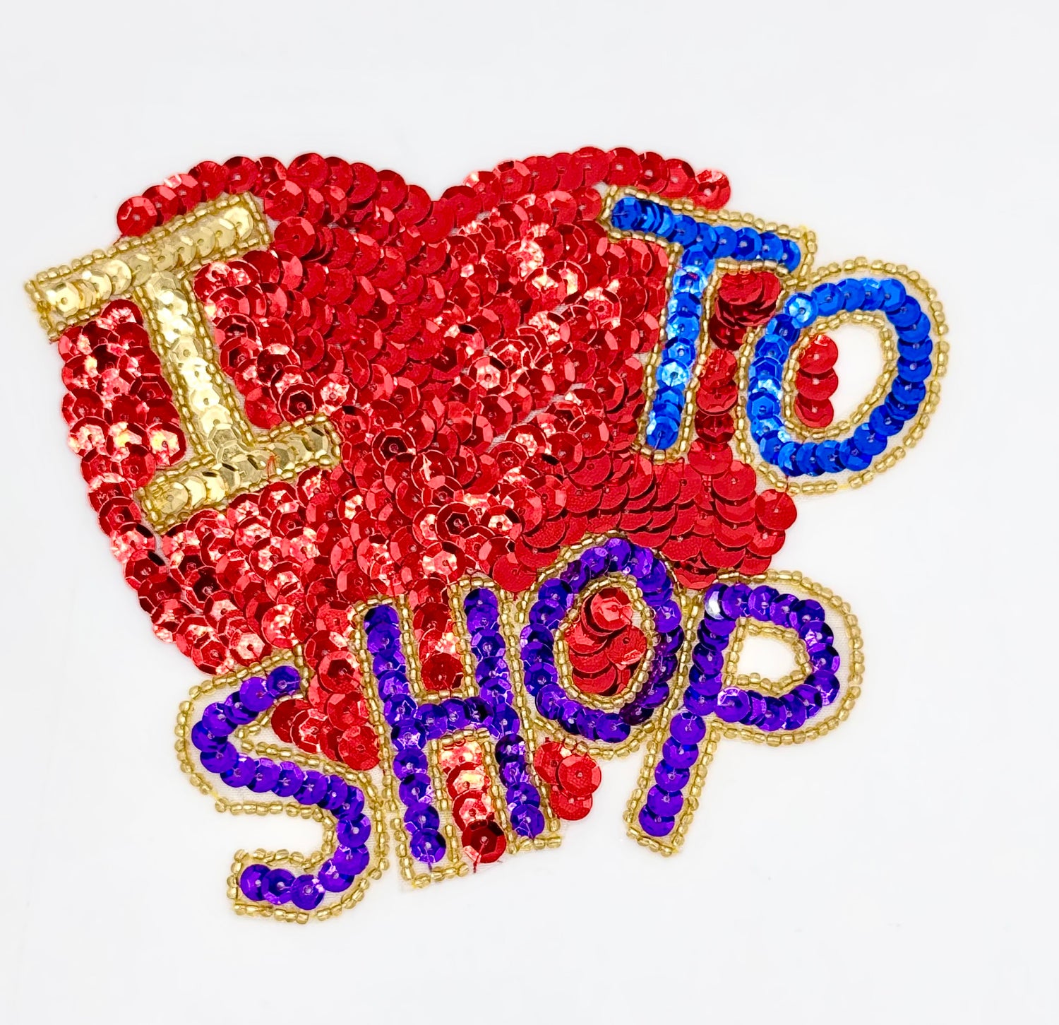 Sequined patch with 'I love to shop' text on a white background
