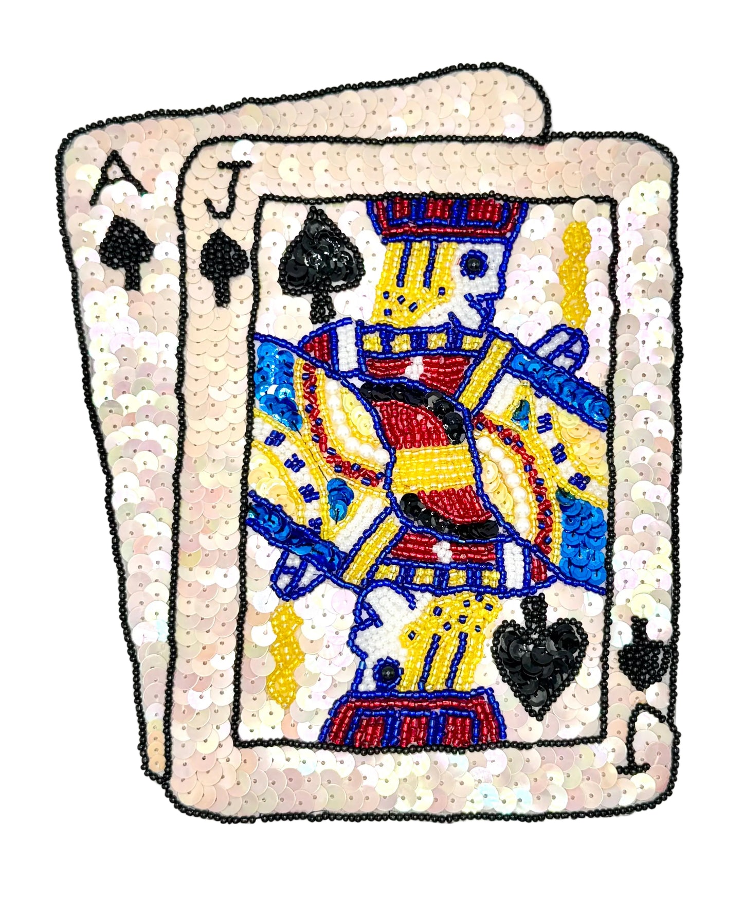 Sequined patch with an Ace and Jack of Spades on a white background