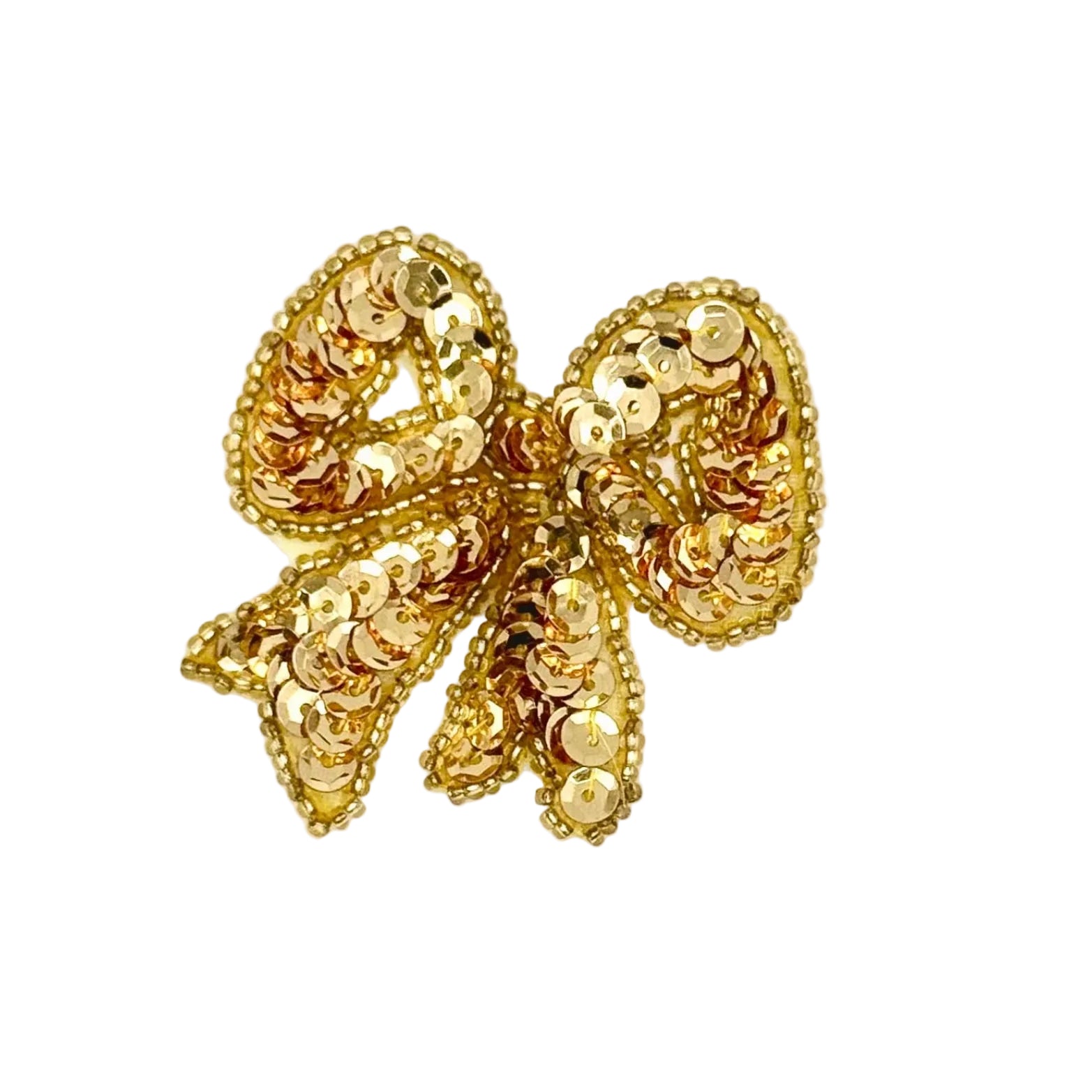 Gold bow with gold sequins and beads on a white background