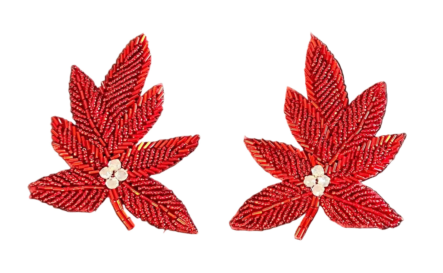 Par de flores rojas con abalorios y pedrería 4" x 3"