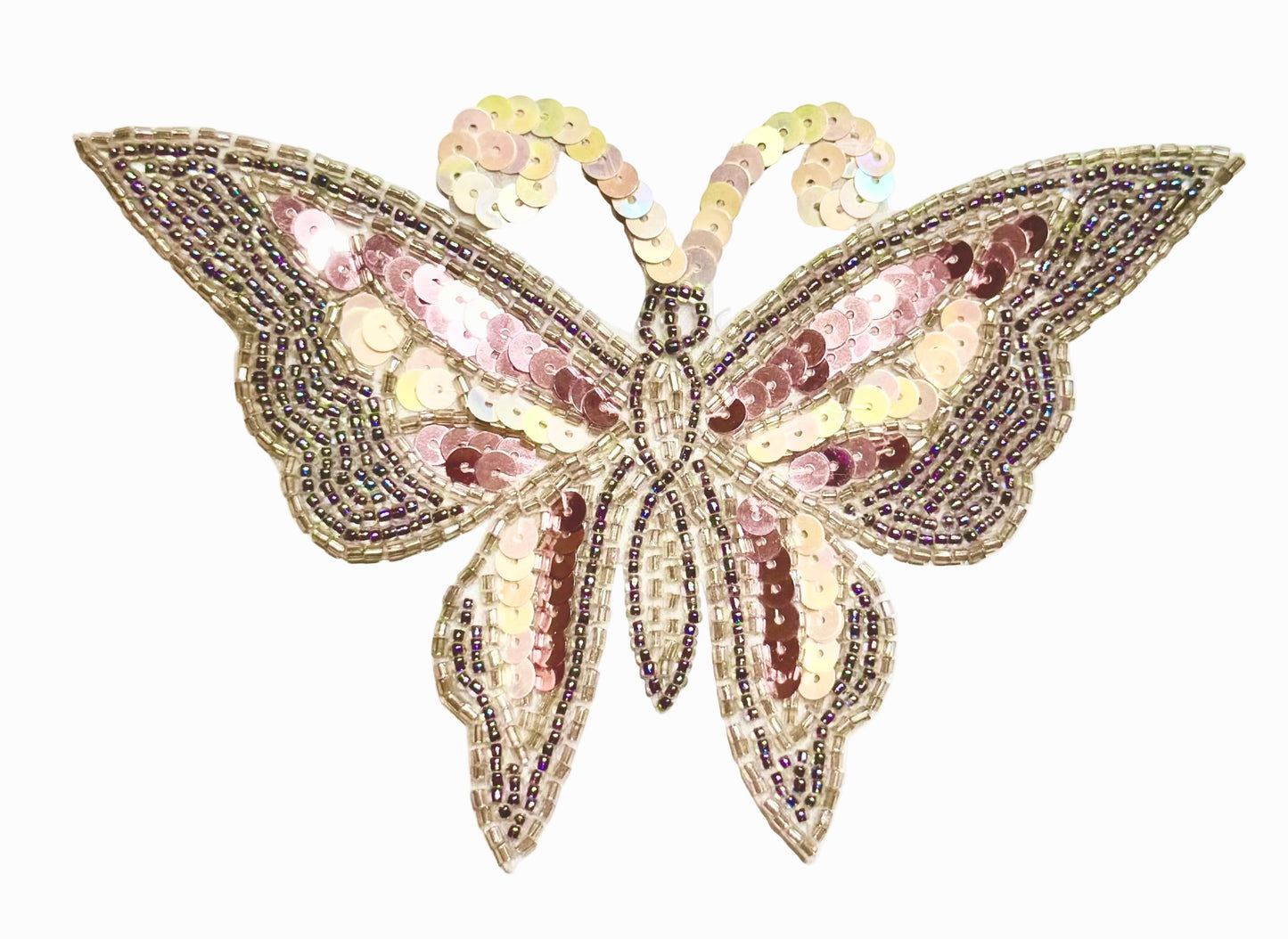 Decorative butterfly with sequins on a white background