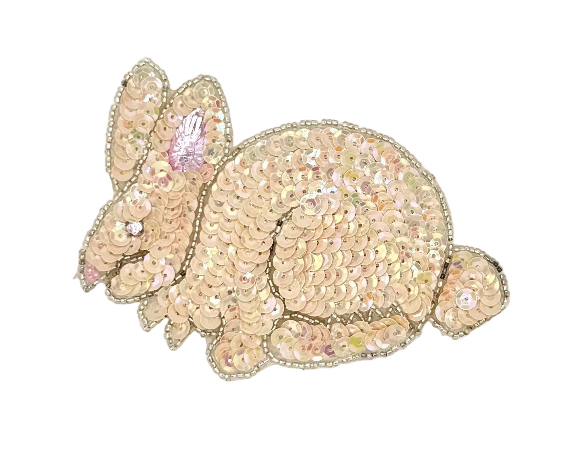 Sequined bunny patch with pink accents on a white background