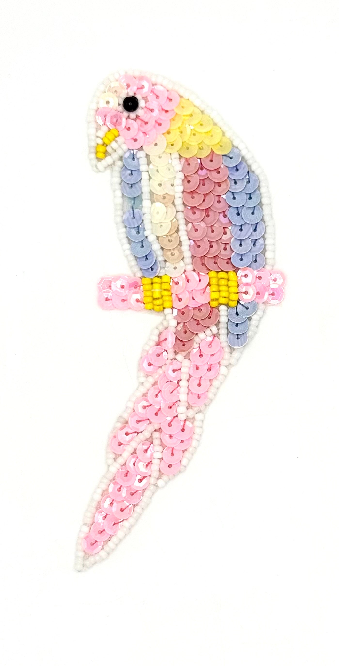 Decorative pen with a parrot design made of colorful beads on a white background