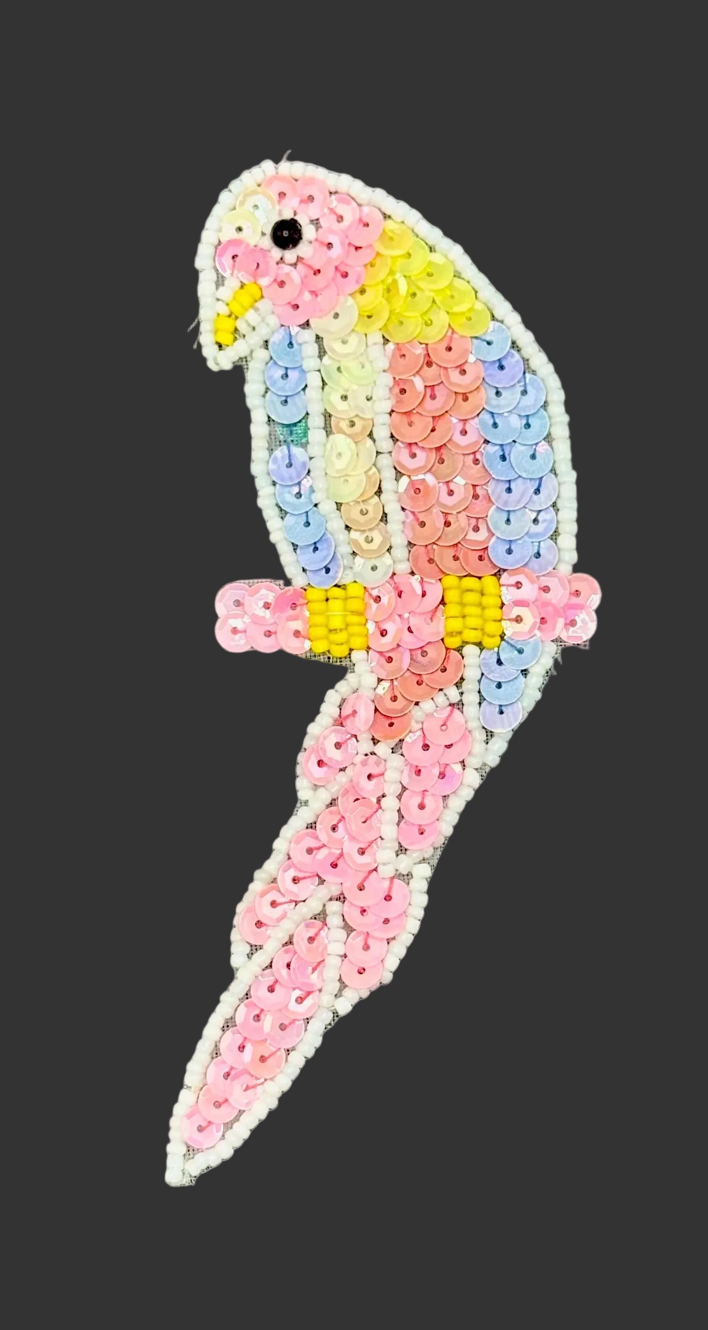 Colorful parrot-shaped bead design on a gray background