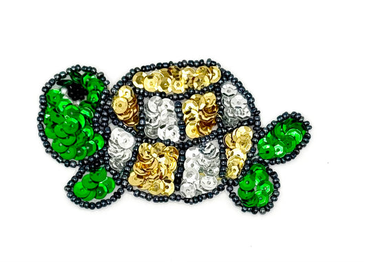 Tortuga con lentejuelas y cuentas verdes/doradas/plateadas de 3.25" x 1.75"
