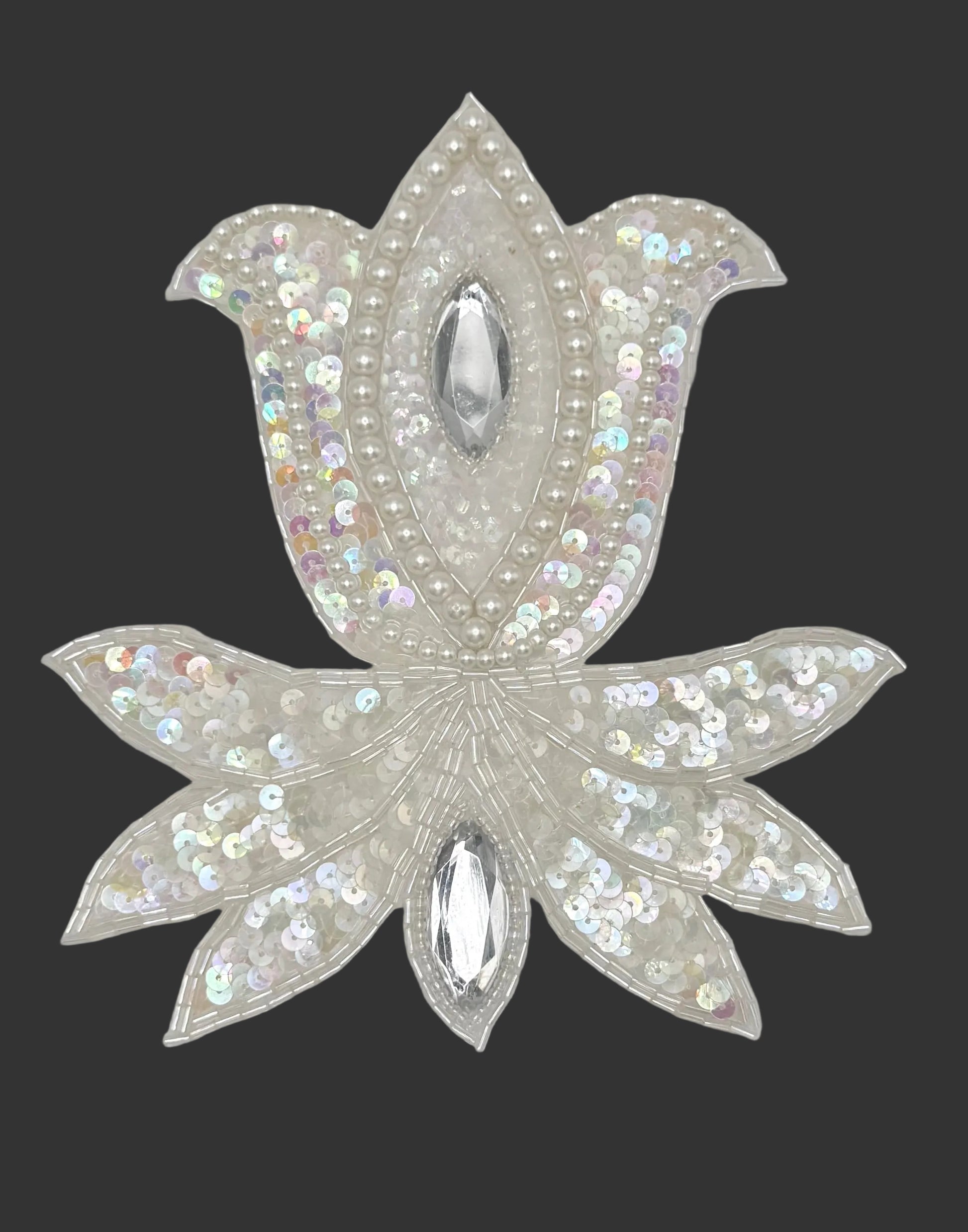Decorative tulip with sequins on a white background