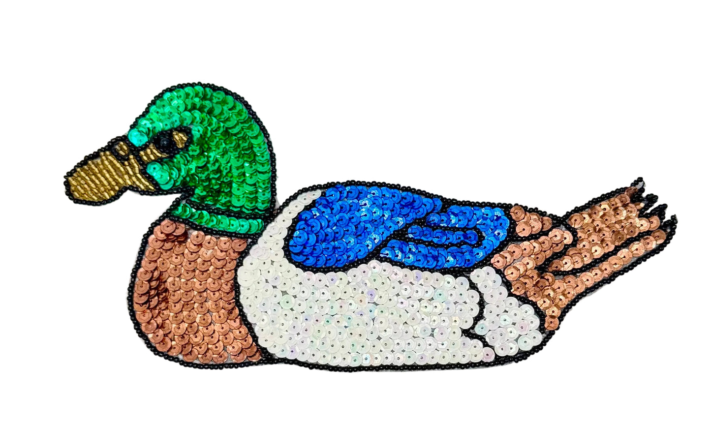 Sequined duck patch on a white background