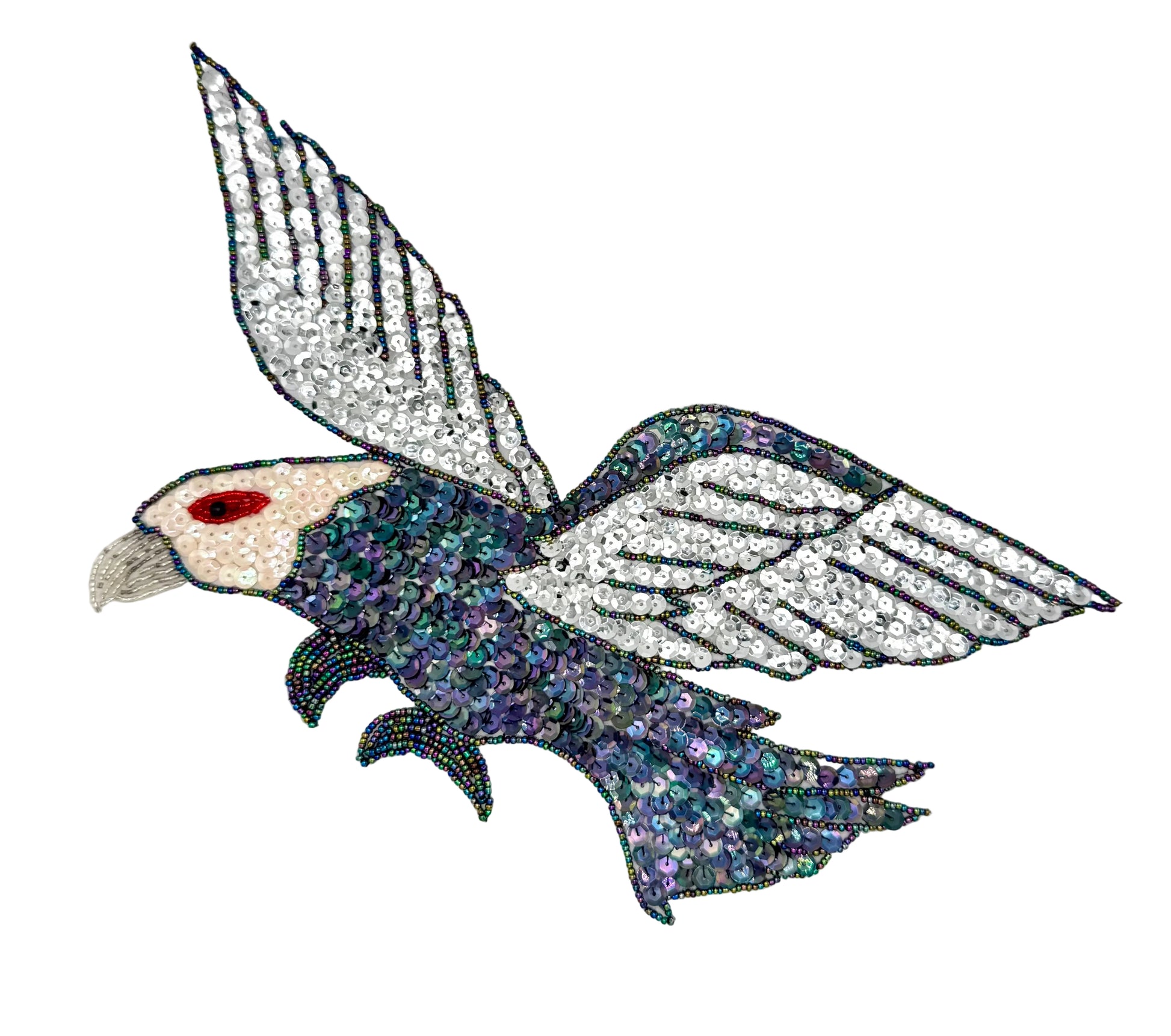 Decorative eagle design with sequins on a white background