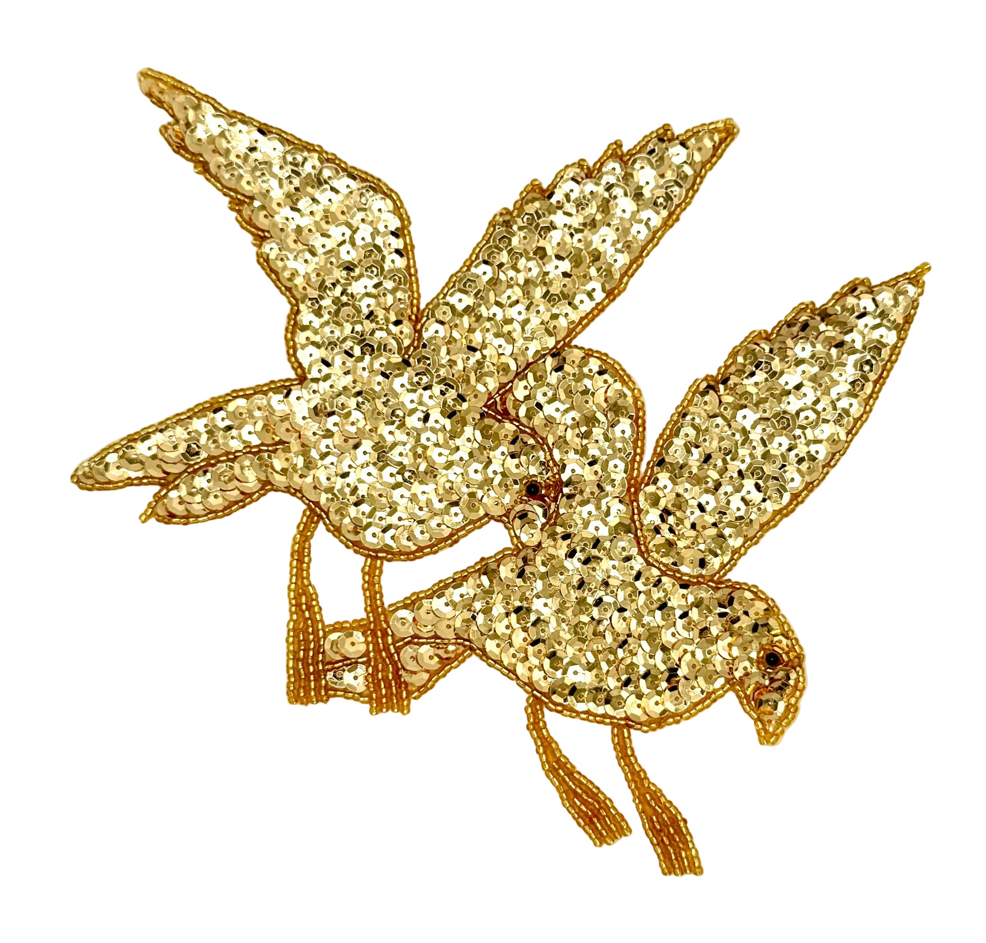 Two Gold sequin dove s flying with on a white background