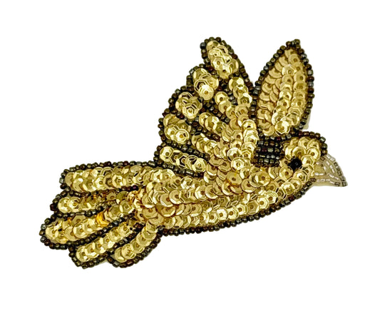 Gold sequin dove patch on a white background