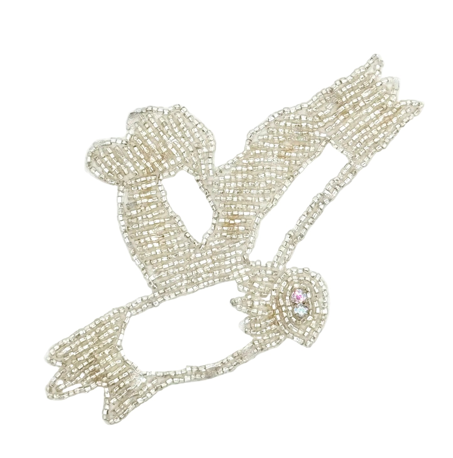 Decorative dove applique with AB rhinestones and silver beads on a white background