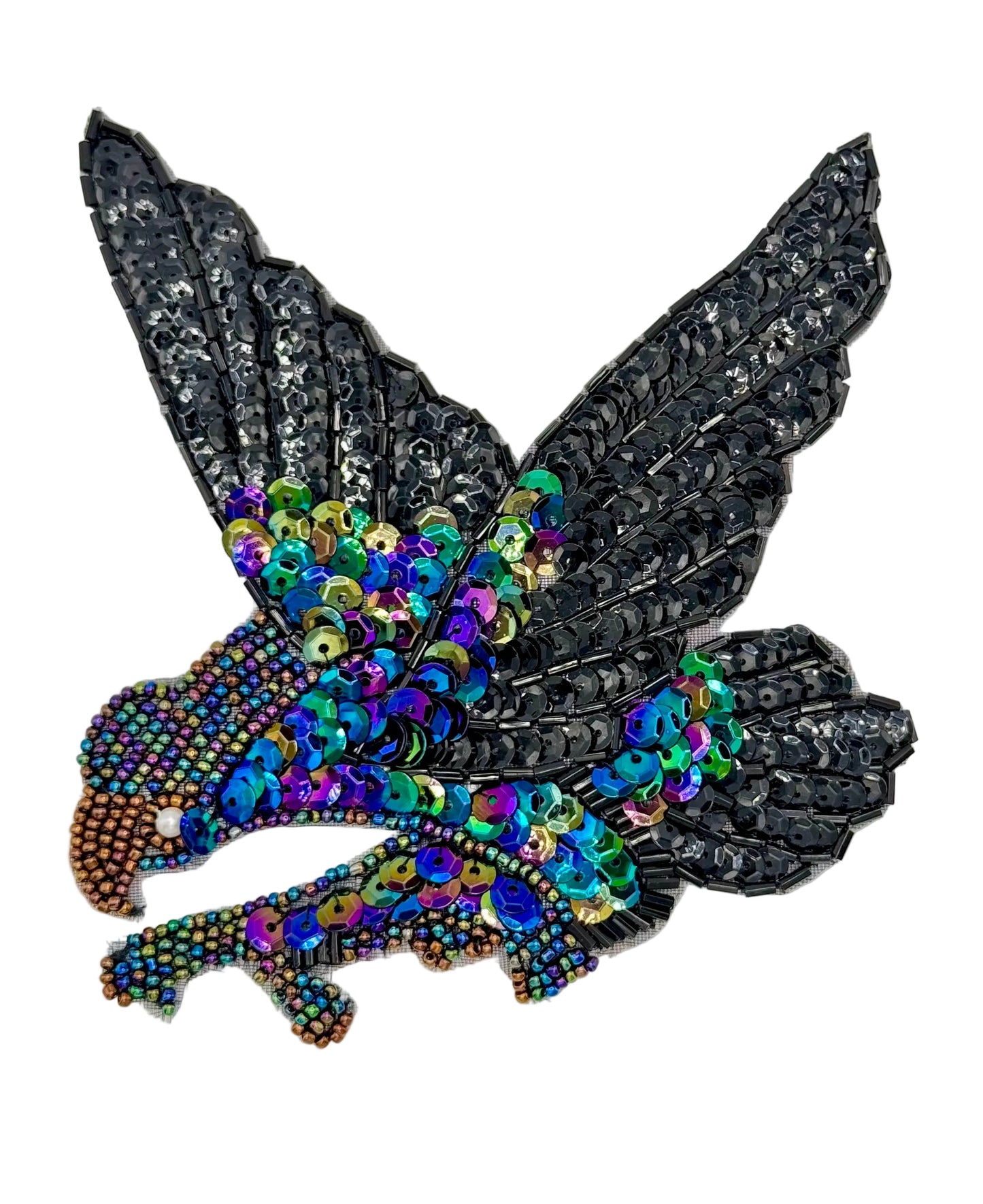 Decorative patch with sequined eagle design on a plain background