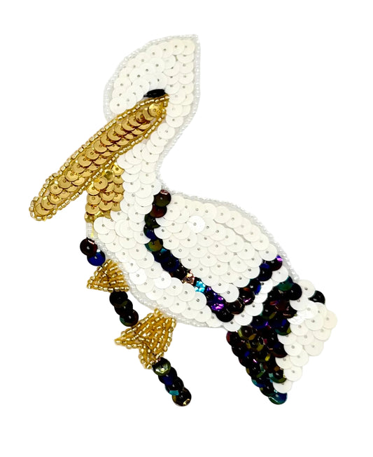 Sequined pelican design on a white background