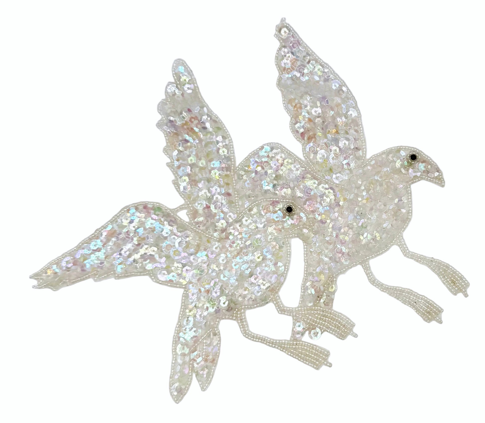 Decorative patch of two doves with iridescent sequins and beads on a white background