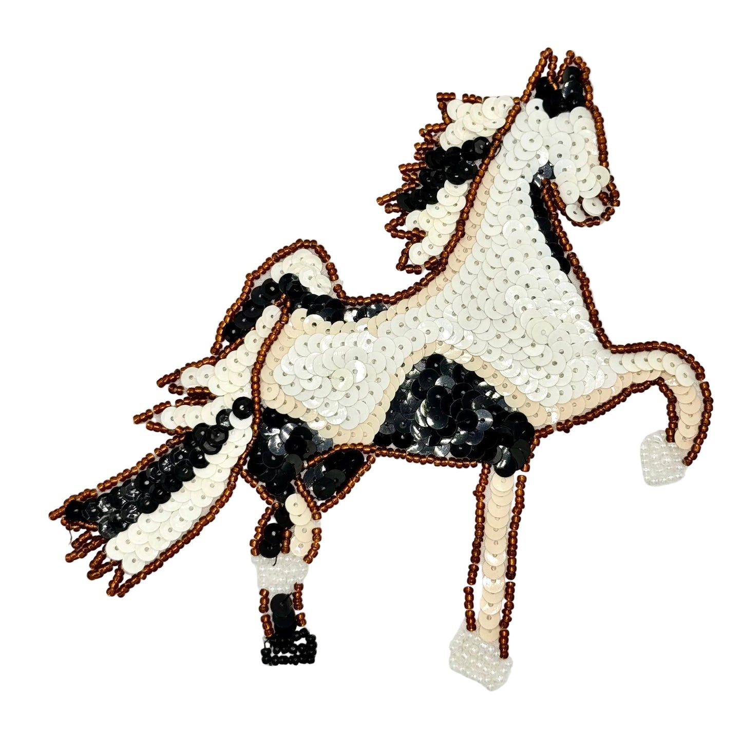 Decorative horse patch with sequins on a white background