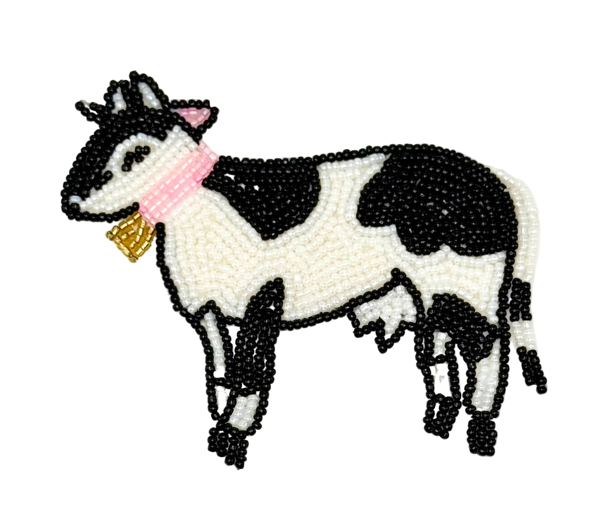 Beaded cow with a pink collar and bell on a white background