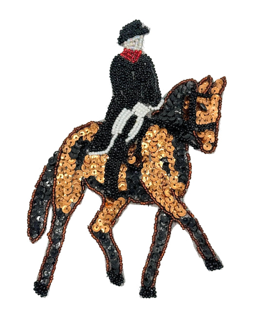 Sequined patch of a horse and rider on a white background