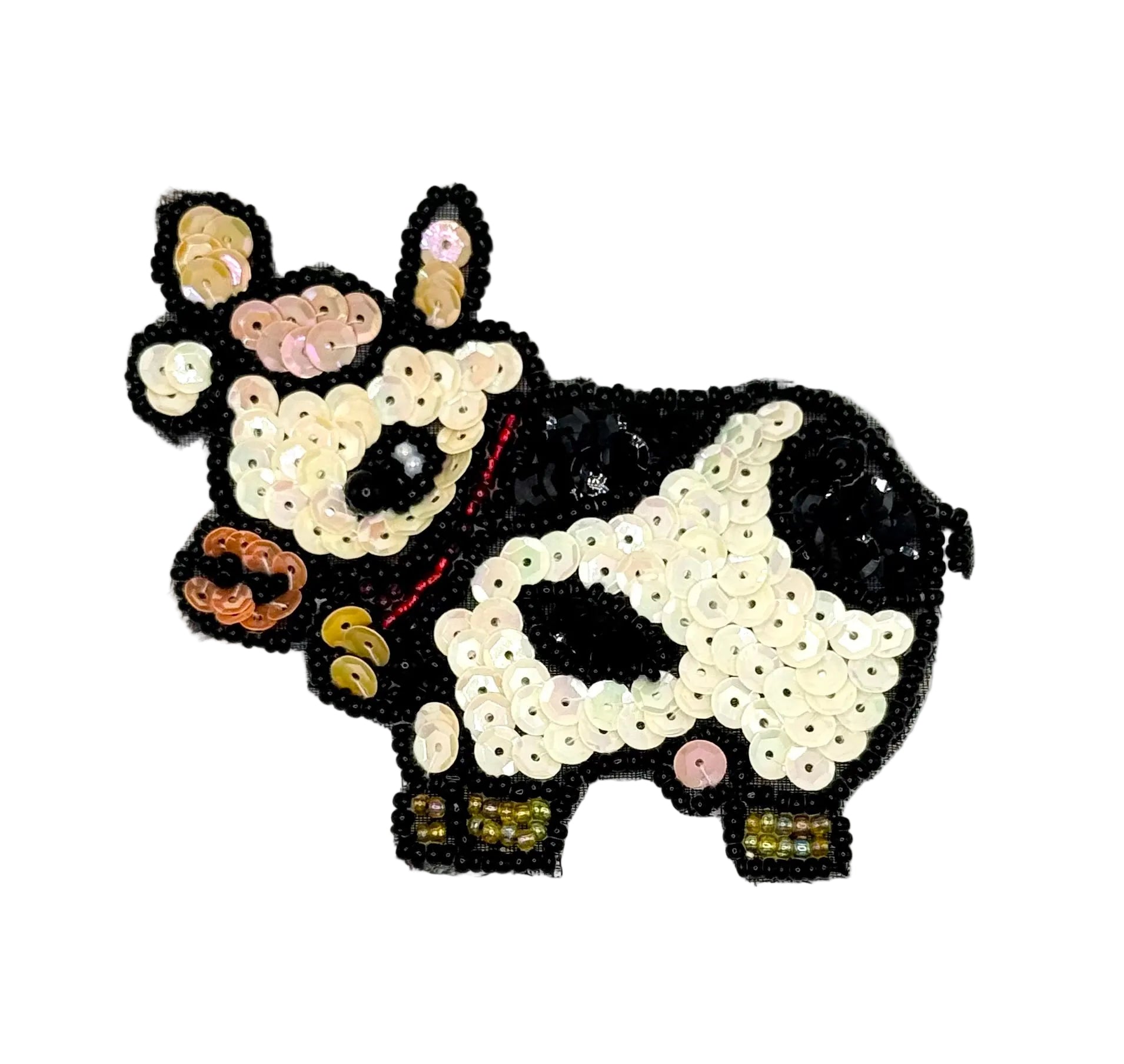 Sequined cow design on a white background