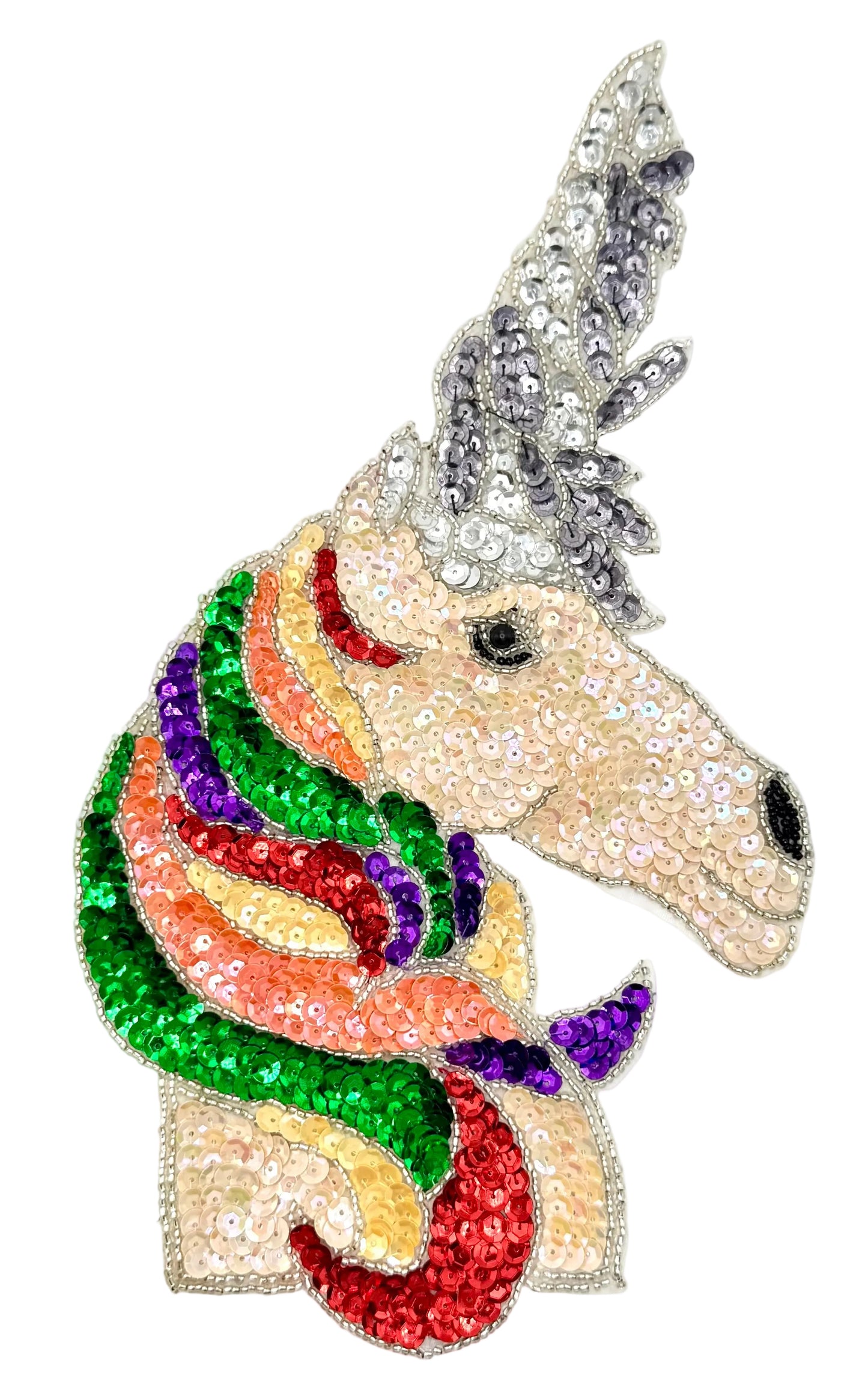 Colorful sequin unicorn head on a white background