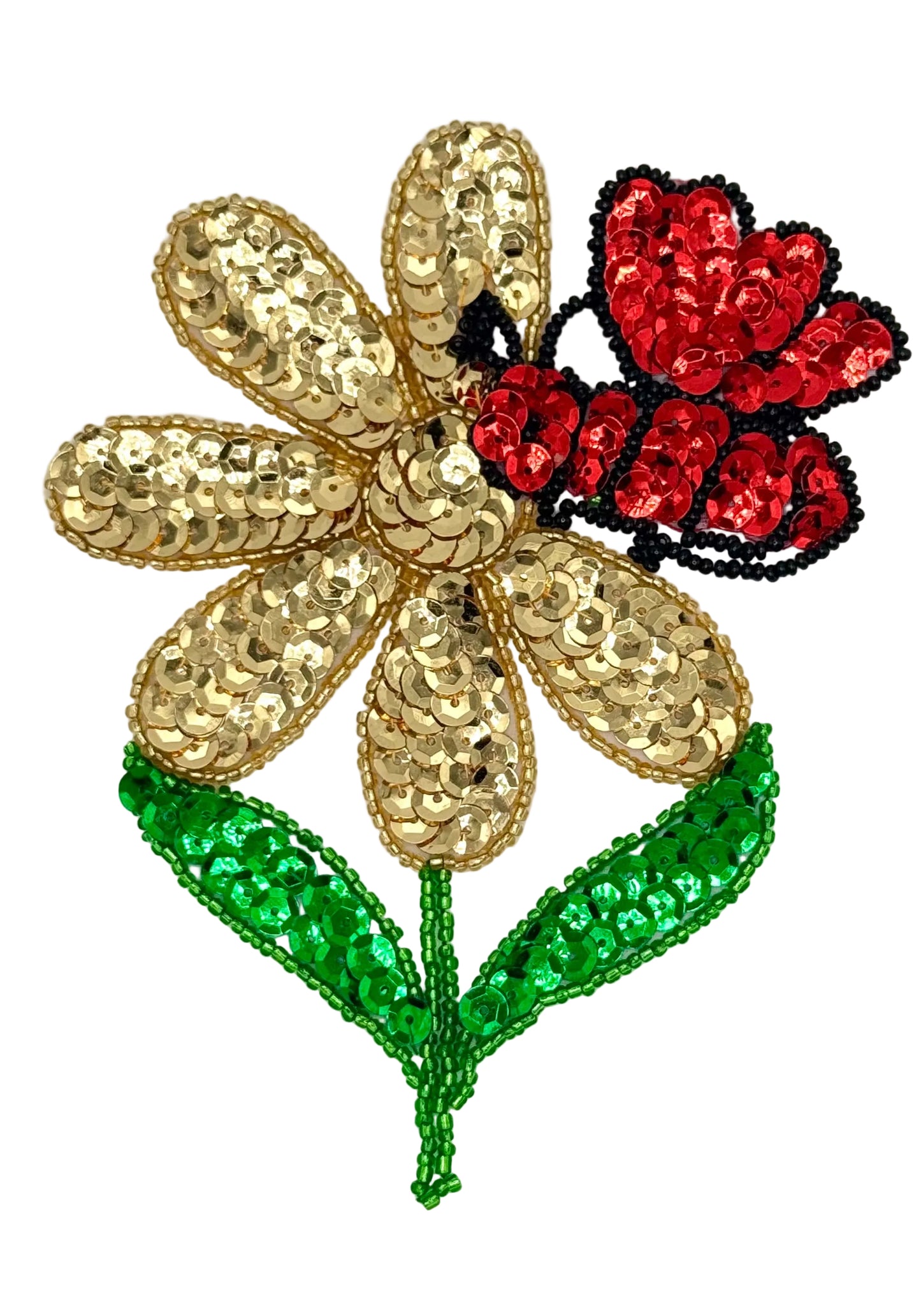 Decorative flower with gold sequin petals, red insect , and green leaves on a white background