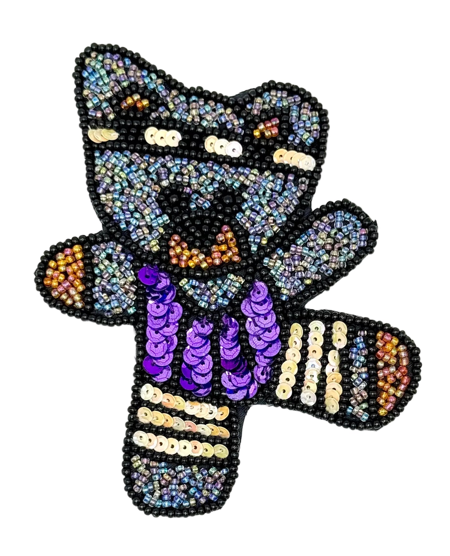 Decorative patch of a bear with sequins on a white background