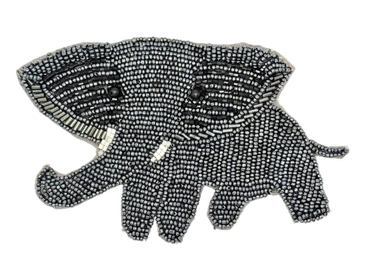 Beaded elephant design on a white background