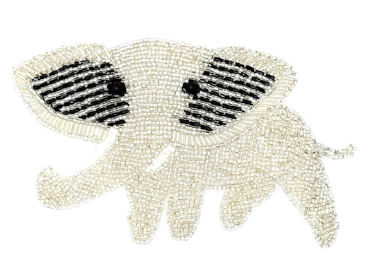 Decorative silver bead elephant patch with black details on a white background