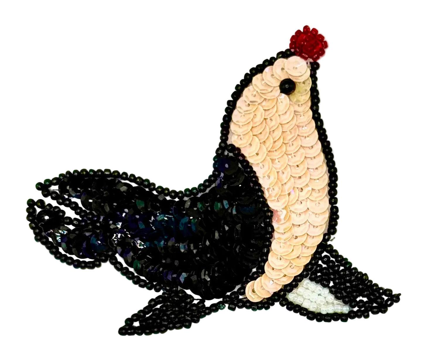  Sequin and bead seal patch with black and beige colors on a white background