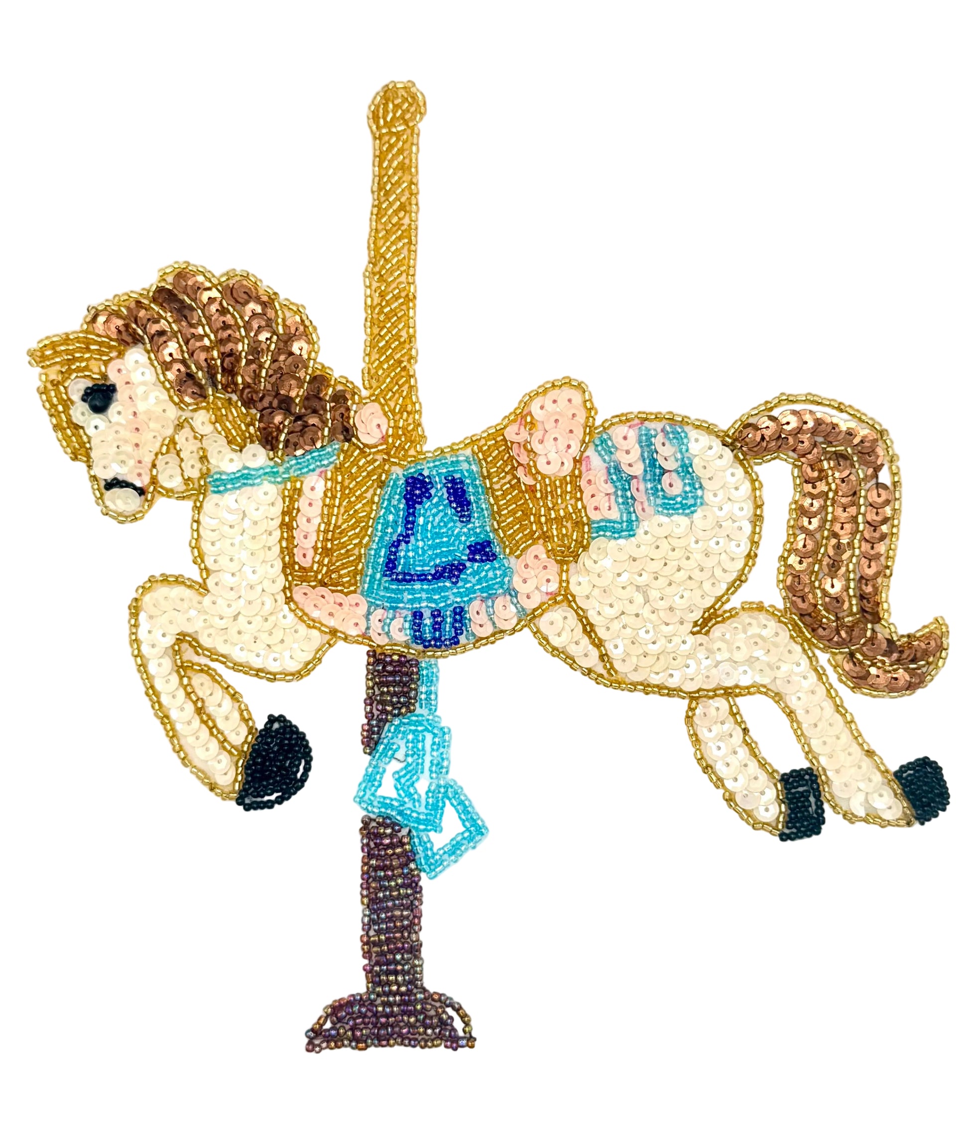 Decorative sequin carousel horse figure on a white background