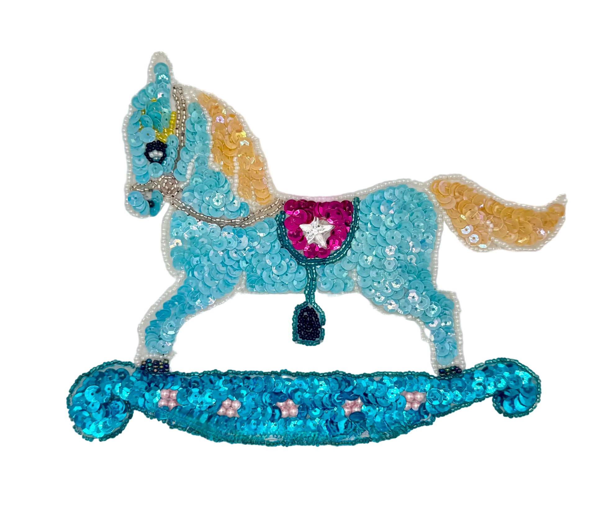 Decorative rocking horse with blue sequins and clear heart on a white background