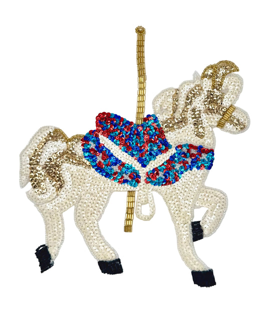 Decorative carousel horse with sequins and bead details on a white background
