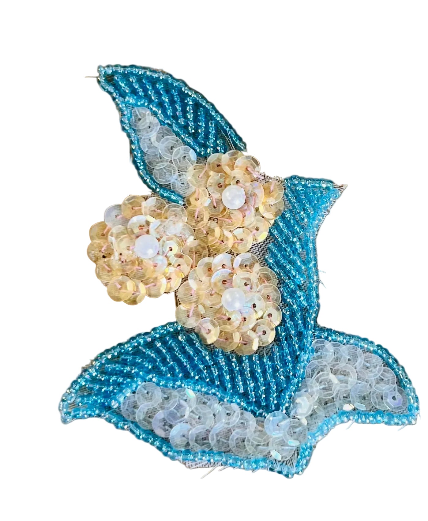 Decorative flower patch with sequins on a white background