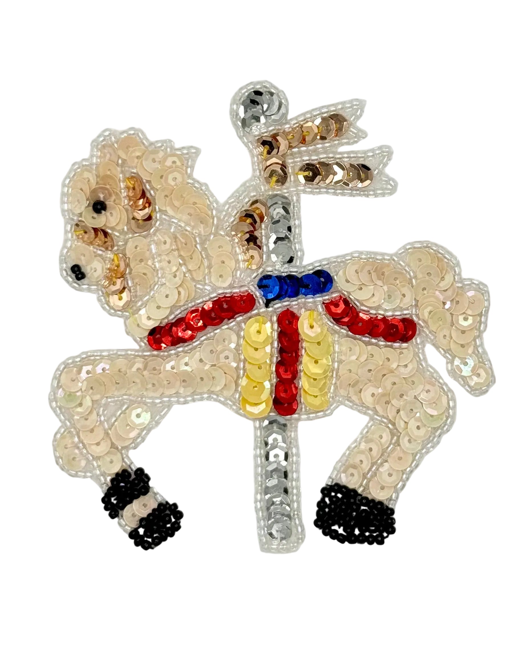 Sequined carousel  horse with sequins and beads on a white background