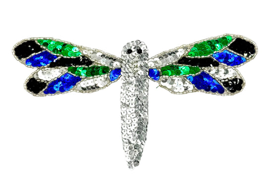 Sequin and bead dragonfly with blue, green, and black wings on a white background