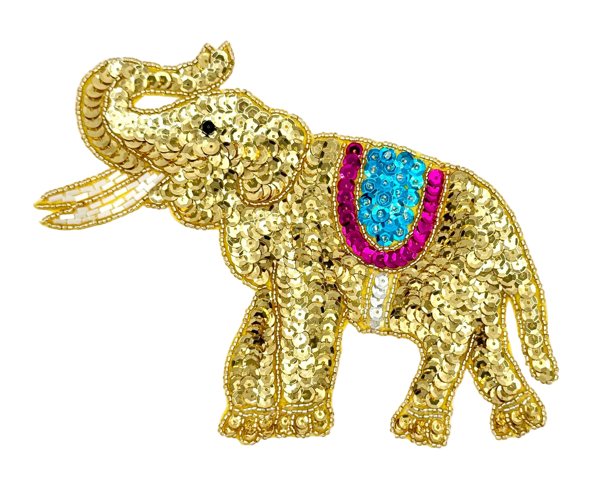 Gold sequined elephant with a turquoise and fuchsia saddle on a white background