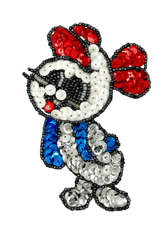 Sequined mouse with red, blue, and white colors on a white background