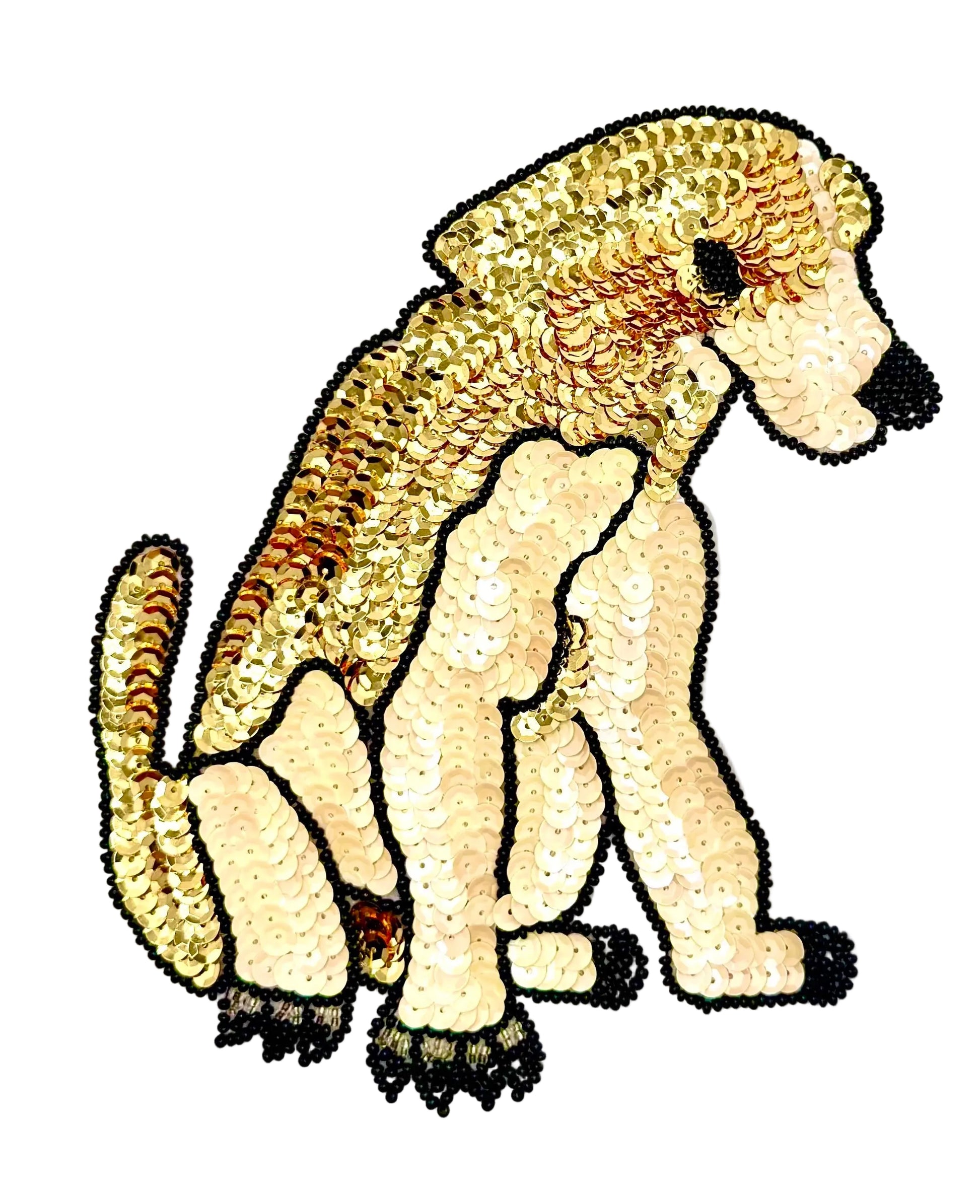 Sequined gold and beige dog patch on a white background
