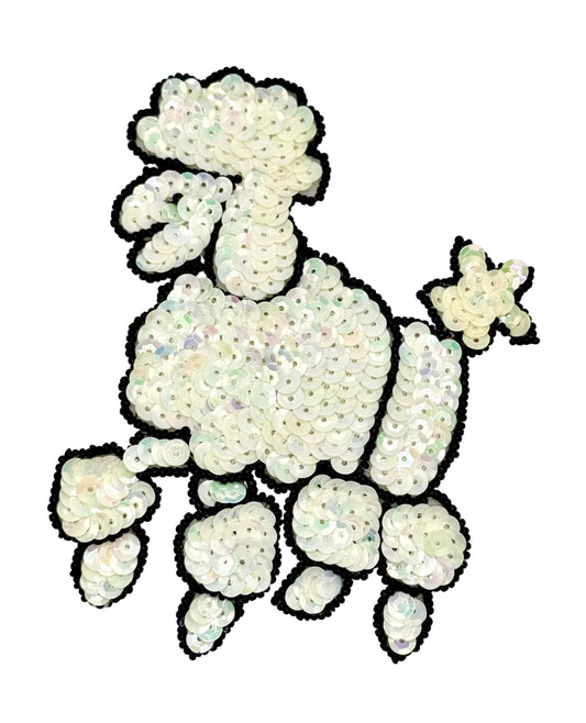 Sequined poodle patch on a white background