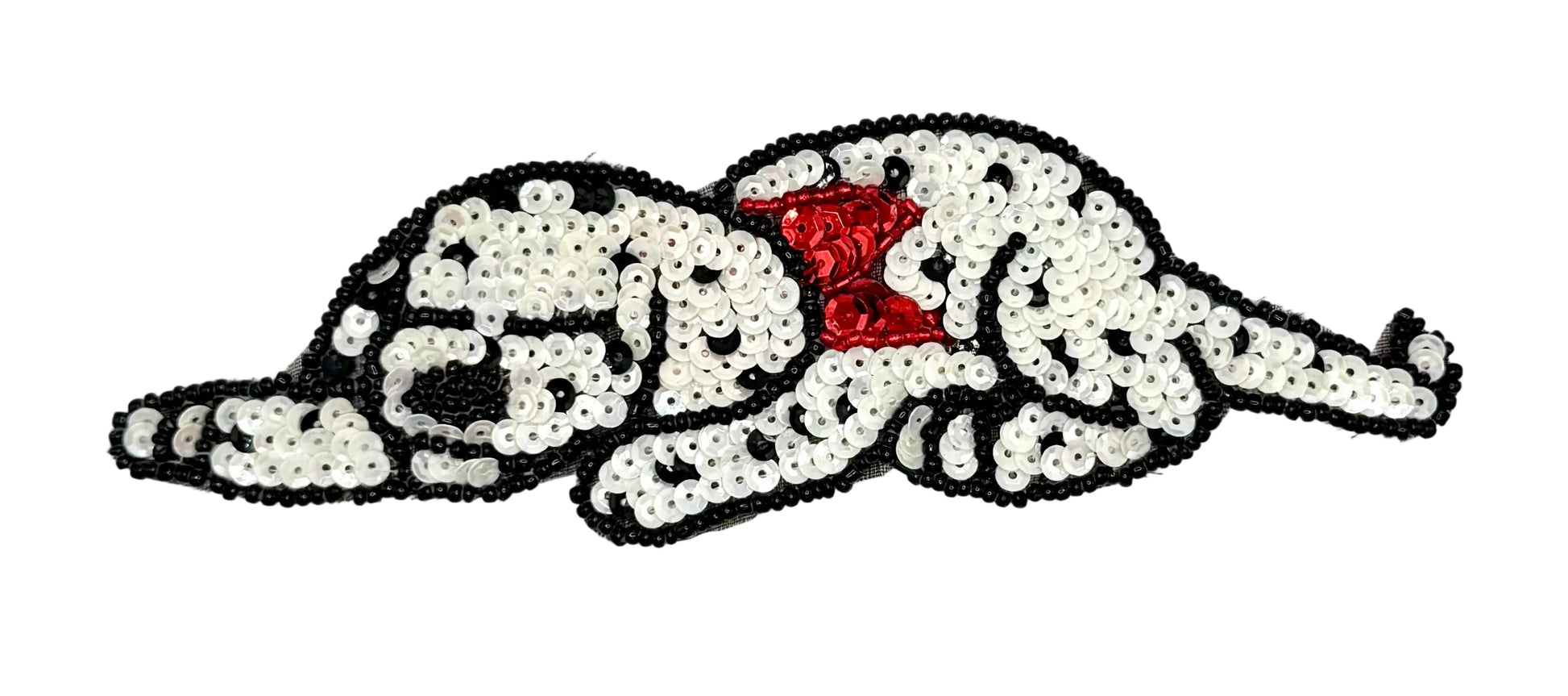 Sequined Dalmatian dog patch with a red bow on a white background