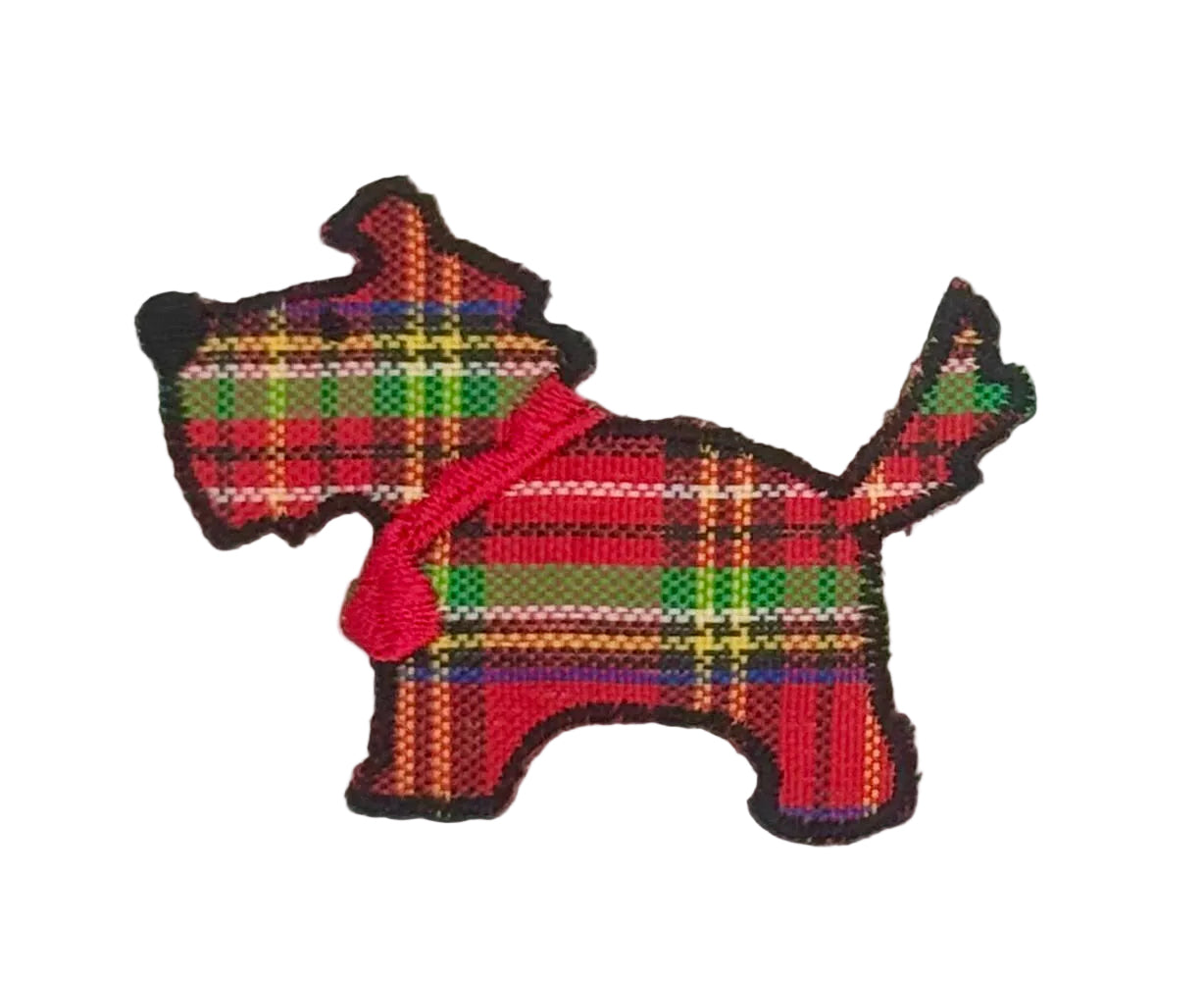 Embroidered Scottie dog with tartan pattern on a white background