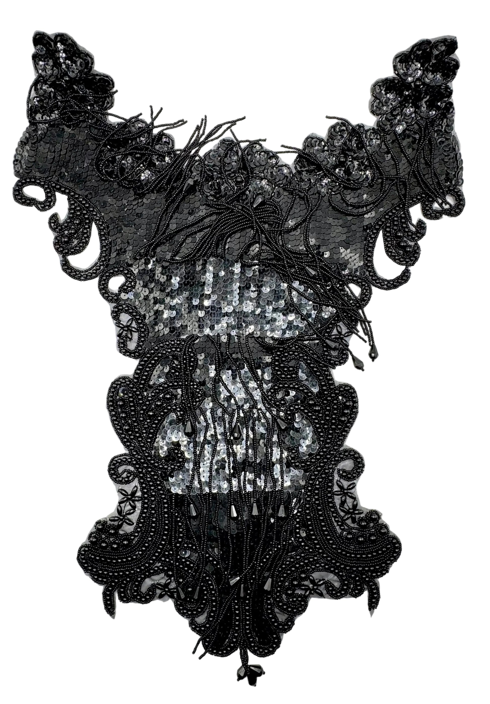 Black sequin and bead embellished bodice on a white background